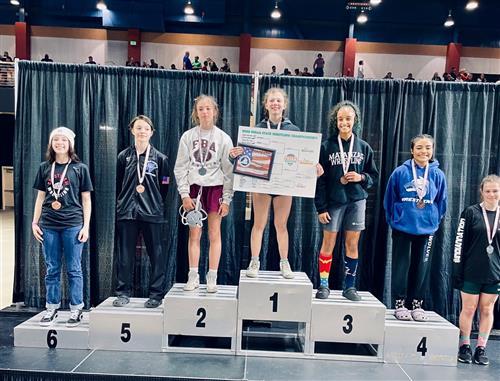 Clare Booe, a sophomore at Palm Harbor University High School, is a new state wrestling champion. She placed first in her weight class at the Florida High School Athletic Association Girls State Wrestling Championships.